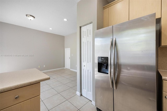 623 NE 21st Ter, Homestead, FL 33033 - kitchen featuring stainless steel refrigerator with ice dispenser, light brown cabinets, light countertops, and recessed lighting