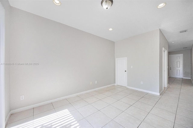623 NE 21st Ter, Homestead, FL 33033 - spare room with light tile patterned floors, recessed lighting, and baseboards