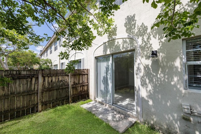 623 NE 21st Ter, Homestead, FL 33033 - rear view of house featuring stucco siding