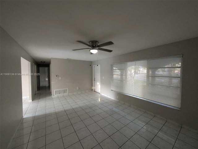 7911 SW 132nd Ave, Miami, FL 33183 - tiled empty room with ceiling fan