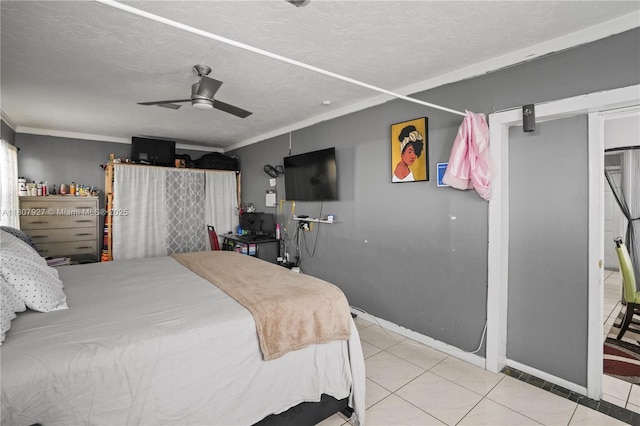 5390 SW 10th Ct, Margate, FL 33068 - bedroom with tile patterned floors, ornamental molding, ceiling fan, baseboards, and a textured ceiling