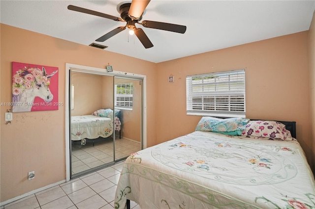 5390 SW 10th Ct, Margate, FL 33068 - bedroom featuring a closet, light tile patterned flooring, baseboards, and ceiling fan