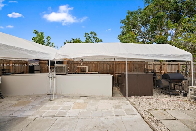 5390 SW 10th Ct, Margate, FL 33068 - fenced backyard featuring a patio and a grill