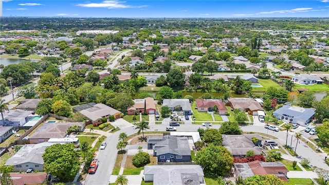 5390 SW 10th Ct, Margate, FL 33068 - aerial view of property and surrounding area featuring nearby suburban area and a large body of water
