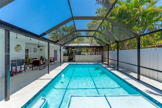 9304 SW 166th Ter, Palmetto Bay, FL 33157 - view of swimming pool with a patio area, glass enclosure, and a ceiling fan
