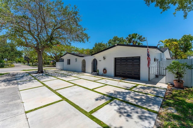 9304 SW 166th Ter, Palmetto Bay, FL 33157 - single story home featuring concrete driveway, stucco siding, an attached garage, and a gate