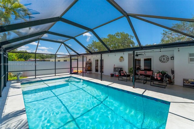 9304 SW 166th Ter, Palmetto Bay, FL 33157 - view of pool with a patio, glass enclosure, ceiling fan, and an outdoor hangout area