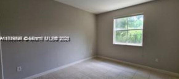 2903 SE 17th Ave Unit 102, Homestead, FL 33035 - empty room featuring baseboards
