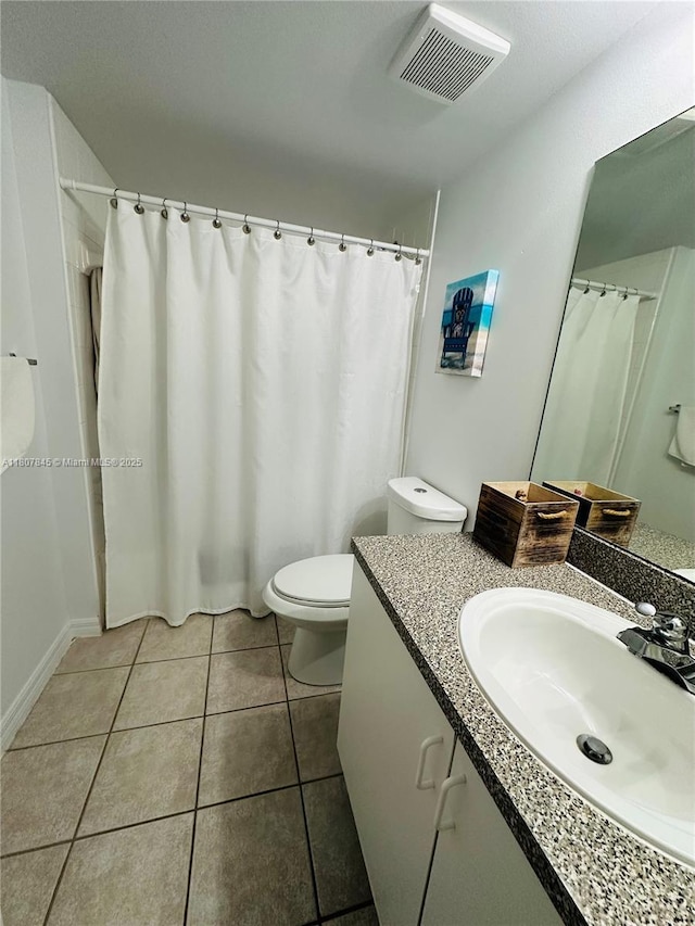 5031 Wiles Rd Unit 304, Coconut Creek, FL 33073 - full bath featuring vanity, toilet, tile patterned floors, a shower with shower curtain, and baseboards