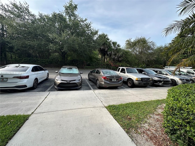 5031 Wiles Rd Unit 304, Coconut Creek, FL 33073 - view of uncovered parking lot