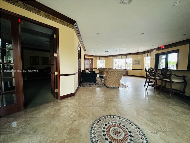 5031 Wiles Rd Unit 304, Coconut Creek, FL 33073 - building lobby featuring ornamental molding