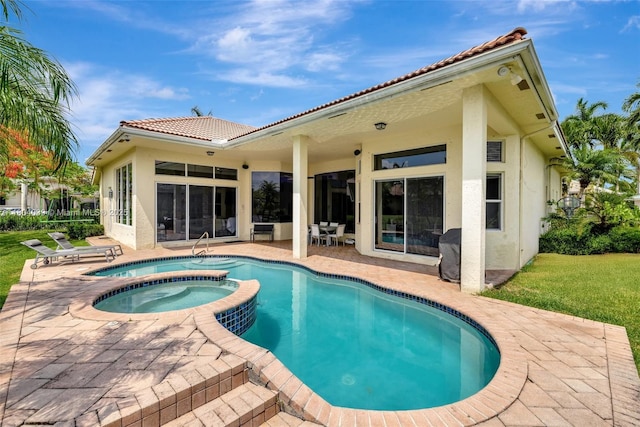 10881 Hawks Vista St, Plantation, FL 33324 - view of pool featuring a patio area and a pool with connected hot tub