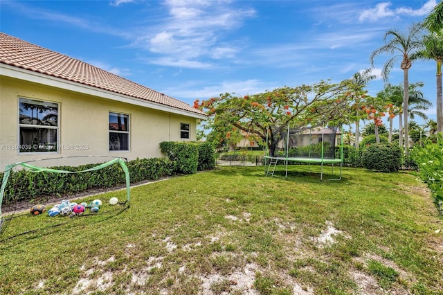 10881 Hawks Vista St, Plantation, FL 33324 - view of yard featuring a trampoline
