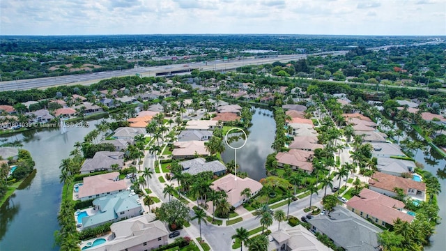 10881 Hawks Vista St, Plantation, FL 33324 - aerial view of property's location featuring nearby suburban area and a large body of water