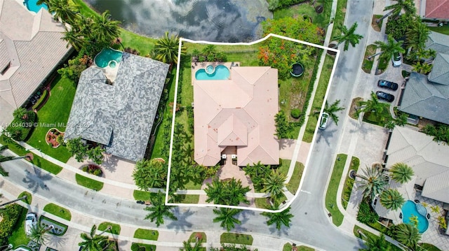 10881 Hawks Vista St, Plantation, FL 33324 - aerial view of property and surrounding area with a pool and property boundaries highlighted