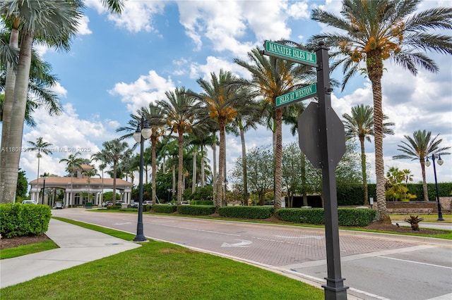 4149 E Gardenia Ave, Weston, FL 33332 - view of road with sidewalks, curbs, and street lighting