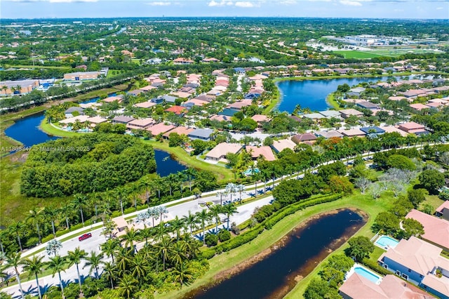 4149 E Gardenia Ave, Weston, FL 33332 - aerial view of property and surrounding area with a large body of water and nearby suburban area