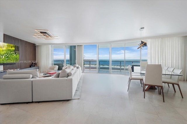 2127 Brickell Ave Unit 2302, Miami, FL 33129 - living area featuring a water view and a wall of windows