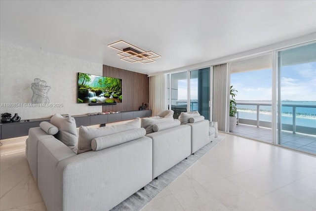 2127 Brickell Ave Unit 2302, Miami, FL 33129 - living area featuring expansive windows and light marble finish floors