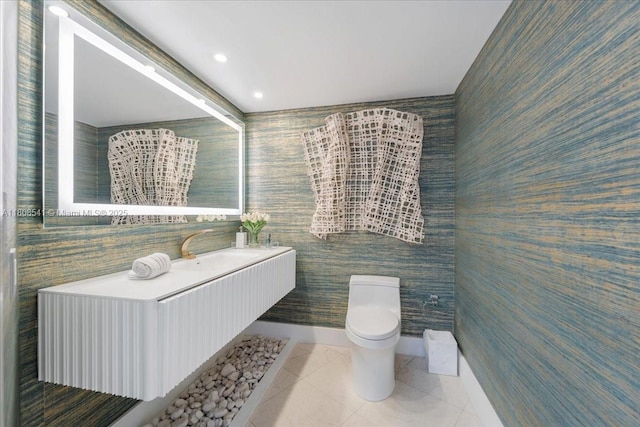 2127 Brickell Ave Unit 2302, Miami, FL 33129 - bathroom featuring toilet, vanity, and tile patterned floors