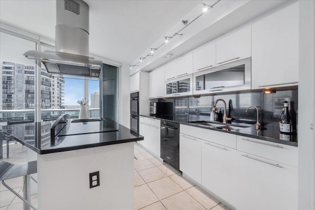 2127 Brickell Ave Unit 2302, Miami, FL 33129 - kitchen with a sink, black appliances, tasteful backsplash, island exhaust hood, and dark countertops