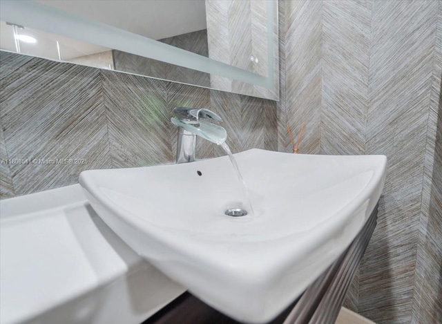 2127 Brickell Ave Unit 2302, Miami, FL 33129 - bathroom featuring a sink and tiled shower