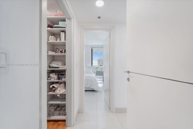 2127 Brickell Ave Unit 2302, Miami, FL 33129 - hallway featuring light tile patterned floors