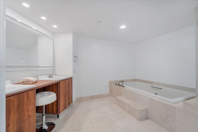 2127 Brickell Ave Unit 2302, Miami, FL 33129 - bathroom with a bath, vanity, recessed lighting, baseboards, and tile patterned floors