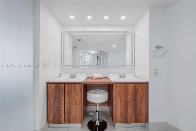 2127 Brickell Ave Unit 2302, Miami, FL 33129 - full bath with double vanity, recessed lighting, and baseboards