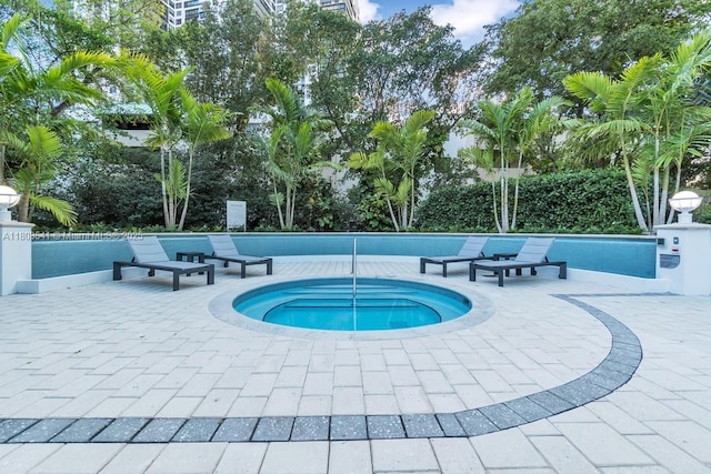 2127 Brickell Ave Unit 2302, Miami, FL 33129 - view of swimming pool with a community hot tub and a patio area