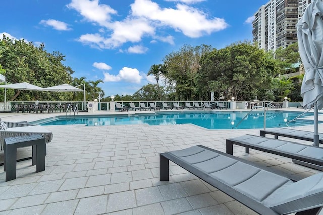 2127 Brickell Ave Unit 2302, Miami, FL 33129 - community pool with a patio area