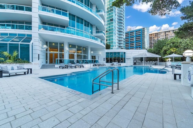 2127 Brickell Ave Unit 2302, Miami, FL 33129 - community pool featuring a patio area