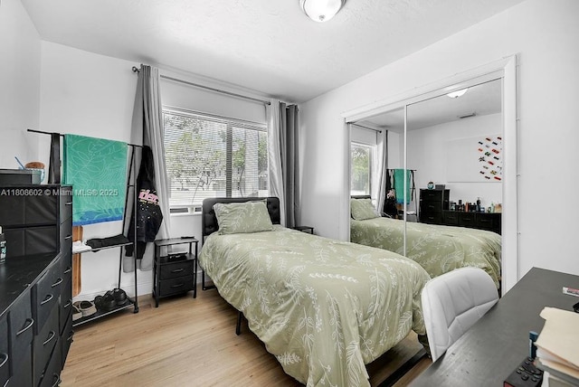 12400 NE 11th Ct, North Miami, FL 33161 - bedroom with wood finished floors and a closet