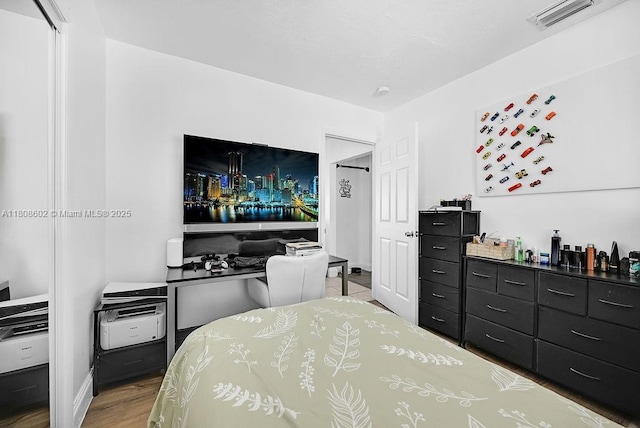 12400 NE 11th Ct, North Miami, FL 33161 - bedroom with wood finished floors
