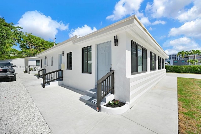 12400 NE 11th Ct, North Miami, FL 33161 - view of home's exterior with stucco siding