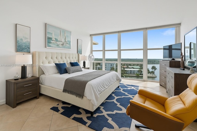 2841 N Ocean Blvd Unit 1105, Fort Lauderdale, FL 33308 - bedroom with light tile patterned floors and expansive windows