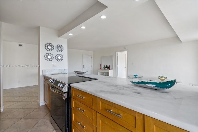 2841 N Ocean Blvd Unit 1105, Fort Lauderdale, FL 33308 - kitchen featuring stainless steel electric range oven, recessed lighting, light tile patterned floors, brown cabinets, and light stone counters