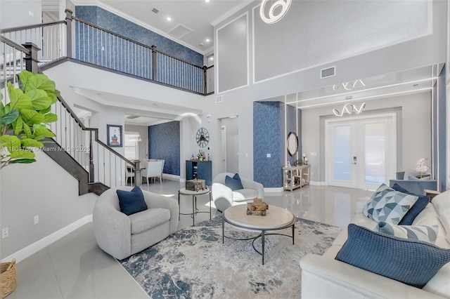 8575 Baypoint Cir, Parkland, FL 33076 - living room featuring stairs, ornamental molding, a towering ceiling, baseboards, and french doors