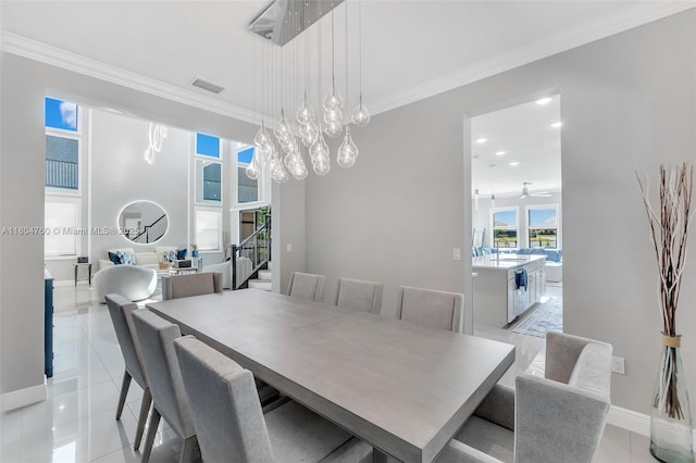 8575 Baypoint Cir, Parkland, FL 33076 - dining room with ornamental molding, light tile patterned floors, a chandelier, baseboards, and recessed lighting