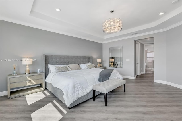 8575 Baypoint Cir, Parkland, FL 33076 - bedroom featuring a tray ceiling, recessed lighting, baseboards, a chandelier, and wood finished floors