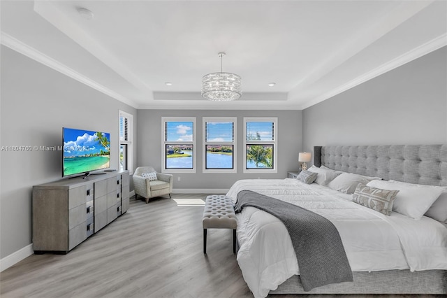 8575 Baypoint Cir, Parkland, FL 33076 - bedroom featuring a raised ceiling, light wood-style flooring, multiple windows, and recessed lighting