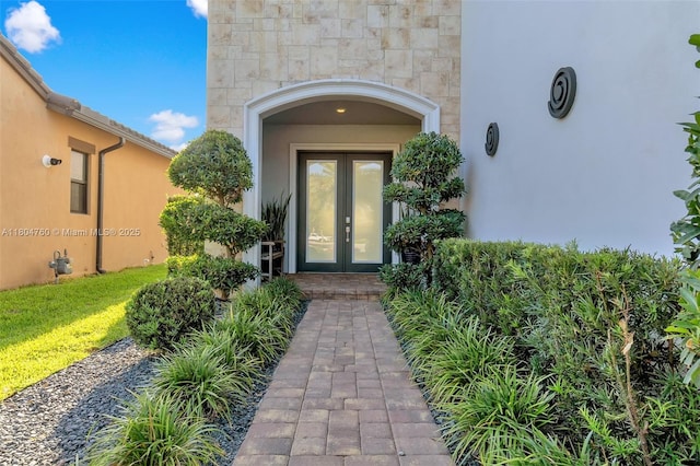 8575 Baypoint Cir, Parkland, FL 33076 - entrance to property featuring french doors and stone siding