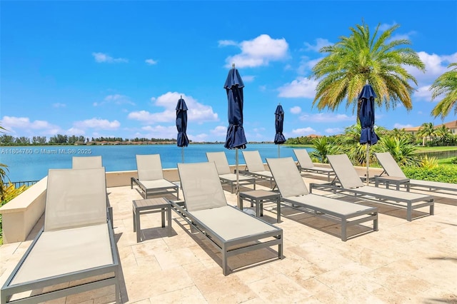 8575 Baypoint Cir, Parkland, FL 33076 - view of patio / terrace featuring a water view