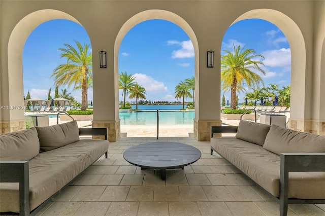 8575 Baypoint Cir, Parkland, FL 33076 - view of patio with an outdoor living space and a community pool