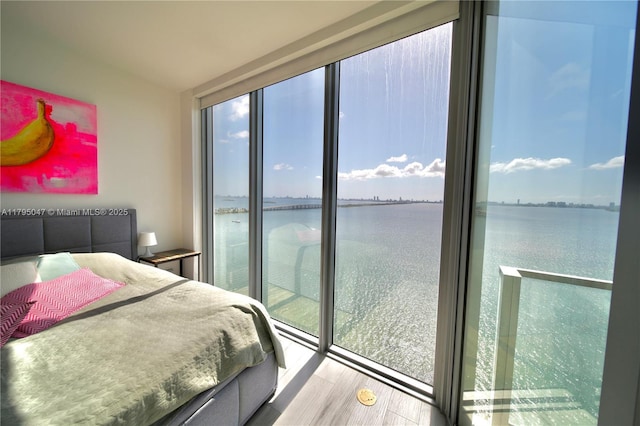 2900 NE 7th Ave Unit 1705, Miami, FL 33137 - bedroom featuring a water view and floor to ceiling windows