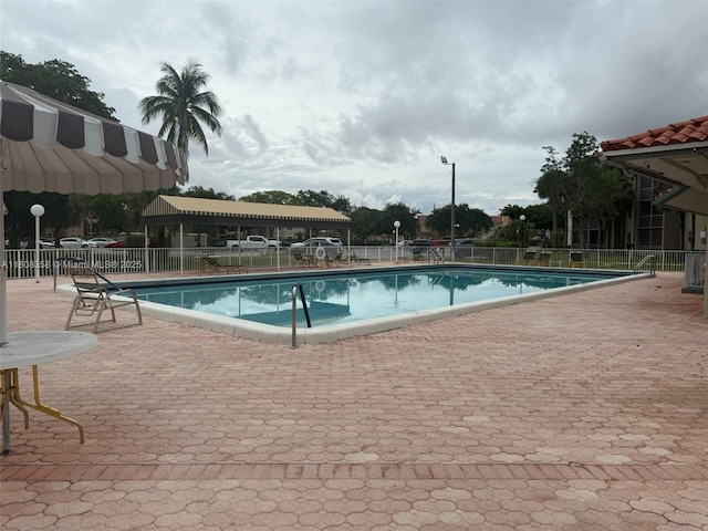 1800 SW 81st Ave Unit 1411, North Lauderdale, FL 33068 - community pool with a patio area