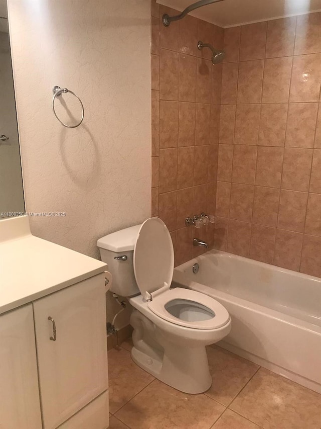 1800 SW 81st Ave Unit 1411, North Lauderdale, FL 33068 - bathroom featuring toilet, shower / bath combination, vanity, tile patterned flooring, and a textured wall