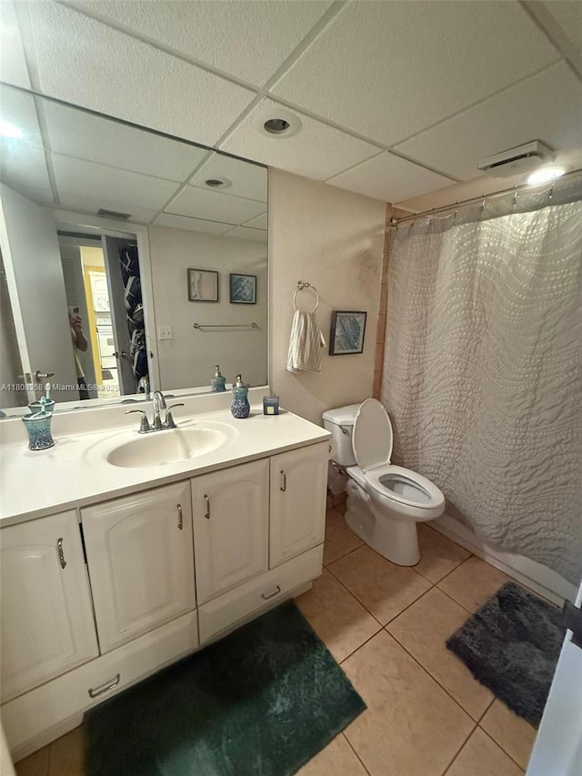 1800 SW 81st Ave Unit 1411, North Lauderdale, FL 33068 - bathroom with tile patterned flooring, toilet, vanity, a paneled ceiling, and a shower with curtain
