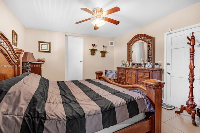 1901 SW 37th Ave, Miami, FL 33145 - bedroom with light tile patterned floors and a ceiling fan