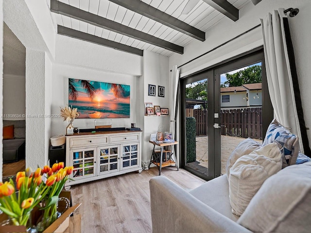 12749 SW 71st Ter, Miami, FL 33183 - living room with beamed ceiling, french doors, and wood finished floors